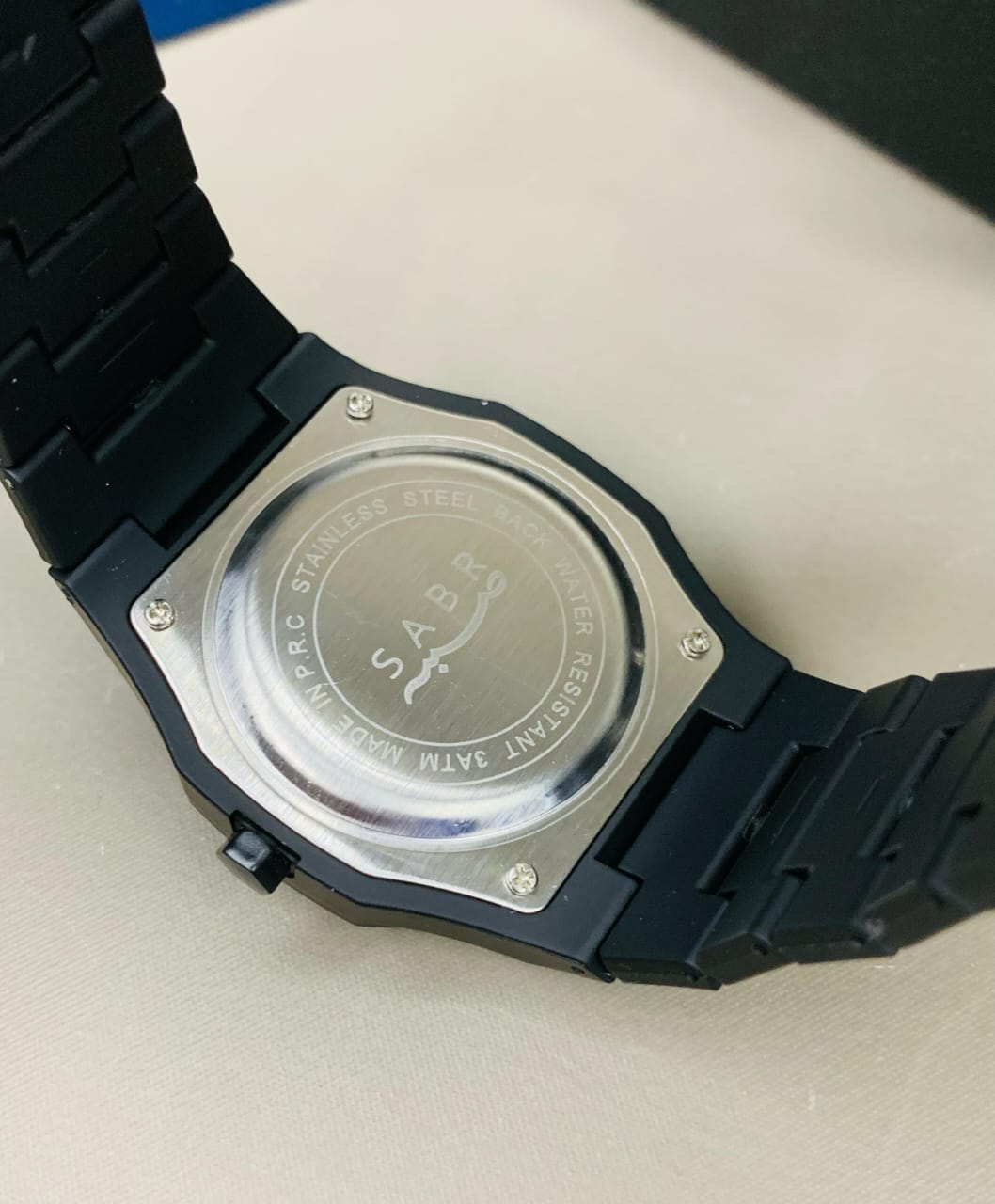 black sabr aura watch with date